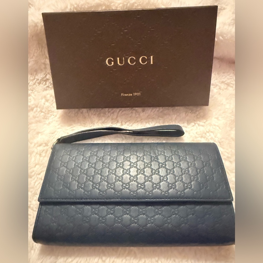 Gucci Navy Embossed/  Guccissma Leather clutch